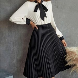 Black and cream neck tie dress size med NWOT